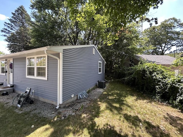 1 Sunderland Ter, Worcester, MA 01604 - view of side of home with a lawn and a central AC unit