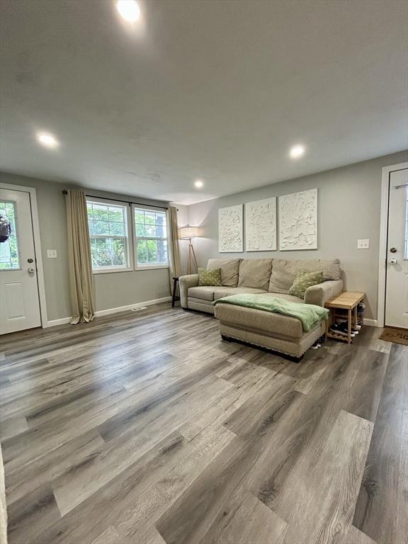 1 Sunderland Ter, Worcester, MA 01604 - living room with dark wood-style flooring and recessed lighting