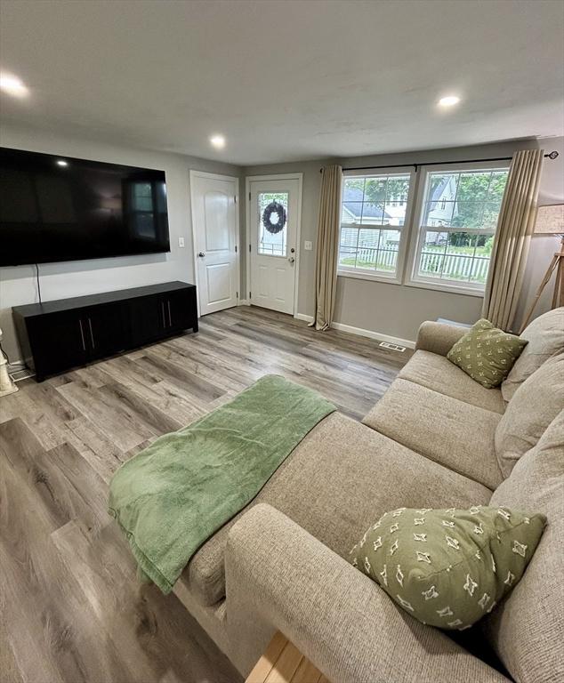 1 Sunderland Ter, Worcester, MA 01604 - living area with wood finished floors and recessed lighting