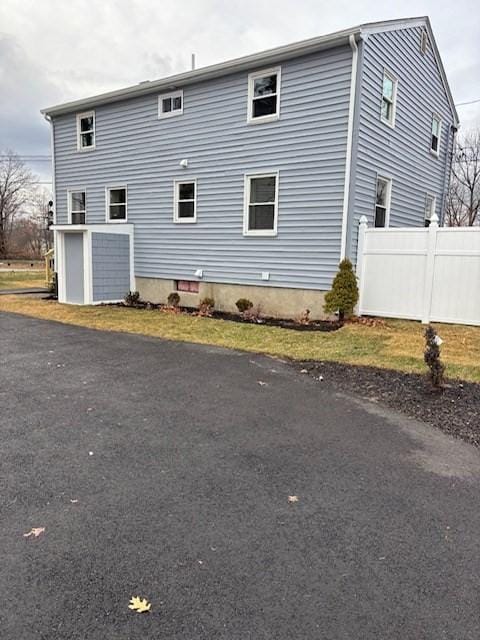 view of home's exterior with a garage