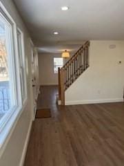 entryway with dark hardwood / wood-style floors