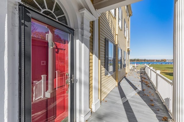 property entrance featuring a water view