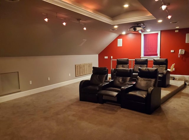 cinema room with carpet flooring and track lighting