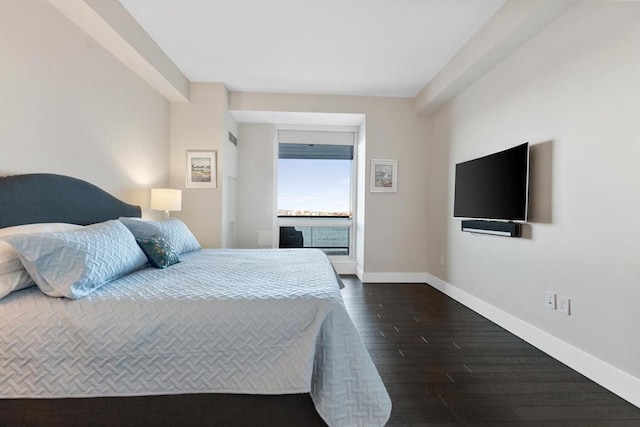 bedroom featuring dark hardwood / wood-style floors