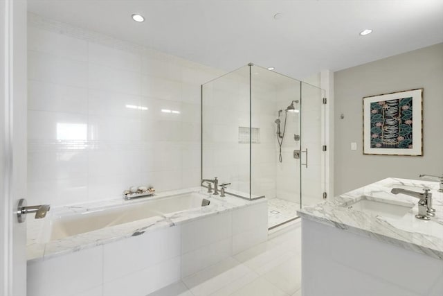 bathroom with vanity, separate shower and tub, and tile patterned flooring