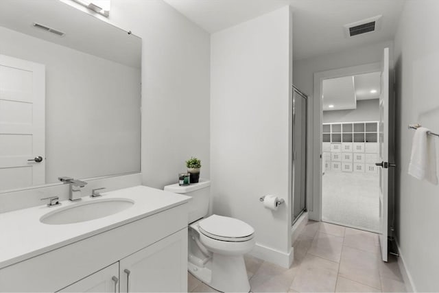 bathroom with visible vents, tile patterned floors, a stall shower, and toilet