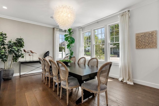 dining room with ornamental molding, baseboards, dark wood-style floors, recessed lighting, and a notable chandelier