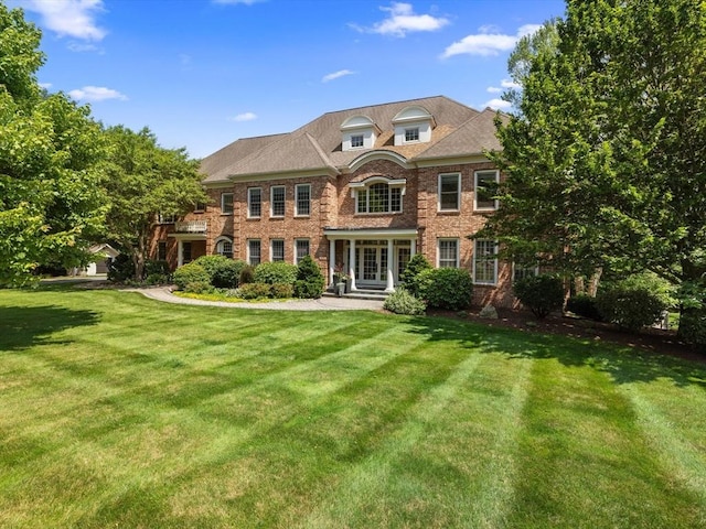 17 Olde Hickory Path, Westborough, MA 01581 - georgian-style home featuring brick siding, a front lawn, and french doors