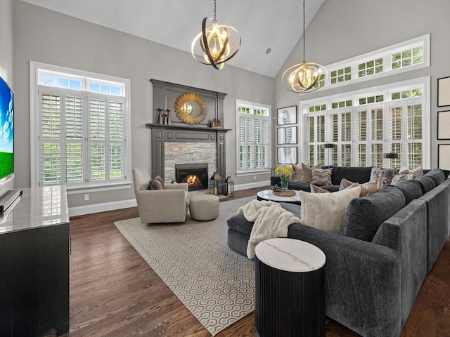 17 Olde Hickory Path, Westborough, MA 01581 - living room featuring a chandelier, high vaulted ceiling, a fireplace, and dark wood finished floors