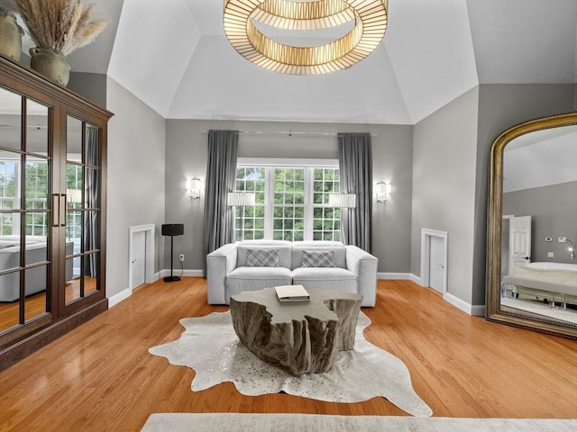 17 Olde Hickory Path, Westborough, MA 01581 - living room featuring wood finished floors, high vaulted ceiling, and french doors