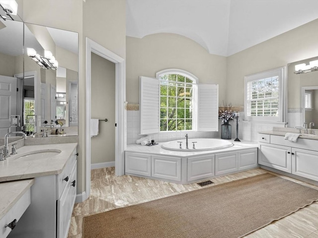 17 Olde Hickory Path, Westborough, MA 01581 - bathroom featuring two vanities and a garden tub