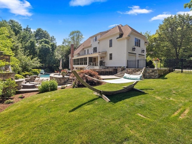 17 Olde Hickory Path, Westborough, MA 01581 - rear view of house featuring a garage, an outdoor pool, a patio, a chimney, and stairway