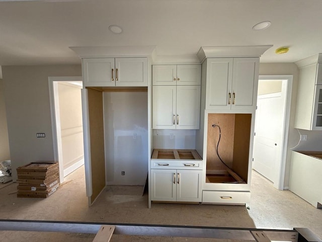 kitchen with white cabinets