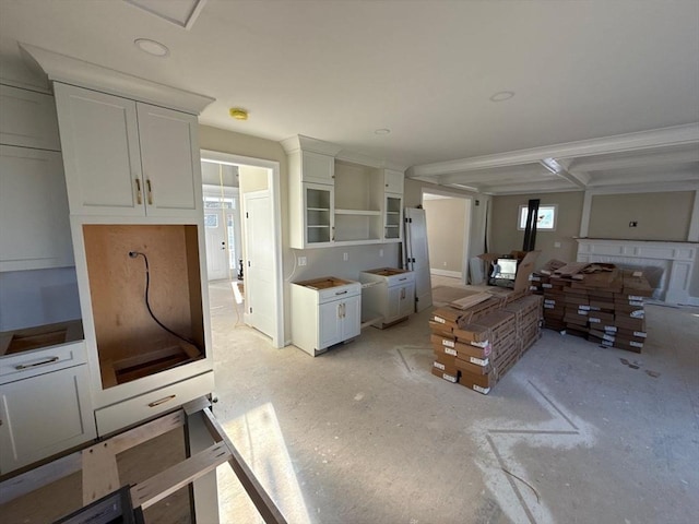 kitchen featuring white cabinetry and open shelves