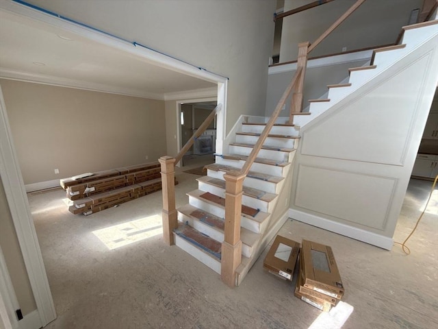 stairs with crown molding