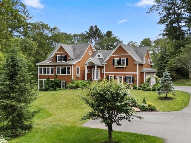 35 Forster Rd, Manchester, MA 01944 - shingle-style home featuring a front yard, driveway, and a garage