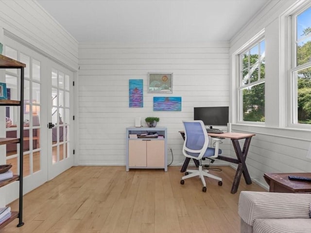 35 Forster Rd, Manchester, MA 01944 - office with french doors, light wood finished floors, and wooden walls