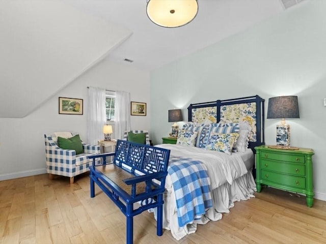 35 Forster Rd, Manchester, MA 01944 - bedroom with lofted ceiling and wood finished floors