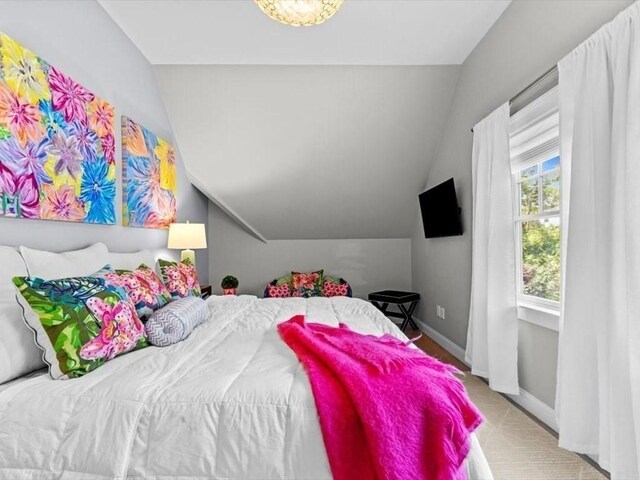 35 Forster Rd, Manchester, MA 01944 - bedroom with lofted ceiling and carpet floors
