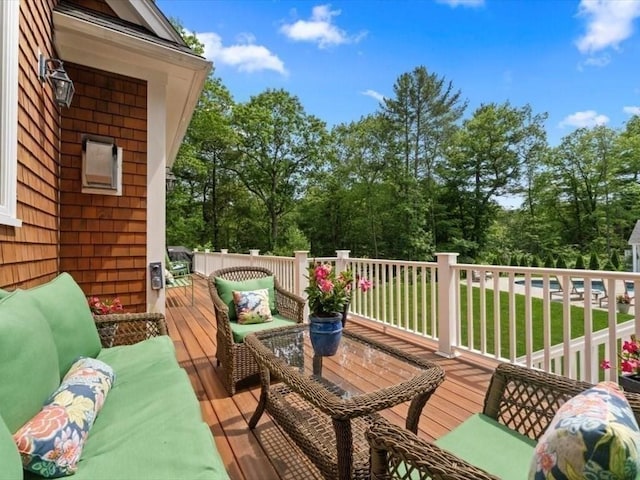 35 Forster Rd, Manchester, MA 01944 - wooden terrace with outdoor lounge area and view of scattered trees