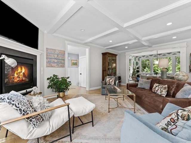35 Forster Rd, Manchester, MA 01944 - living room with coffered ceiling, beam ceiling, recessed lighting, and a glass covered fireplace