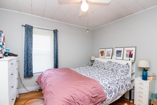 57 Ardale St, Boston, MA 02131 - bedroom with wood finished floors, crown molding, and ceiling fan