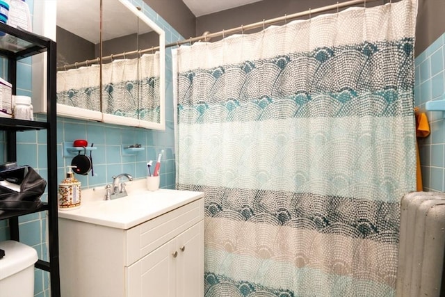 57 Ardale St, Boston, MA 02131 - full bath with radiator, vanity, tile walls, toilet, and curtained shower
