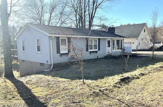 exterior space featuring a front lawn