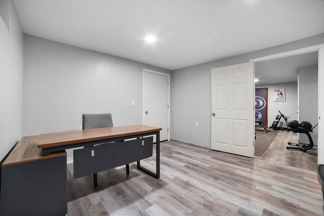 office space featuring wood finished floors