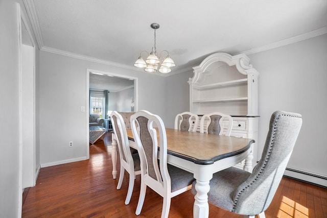 dining space with ornamental molding, wood finished floors, baseboards, baseboard heating, and a notable chandelier