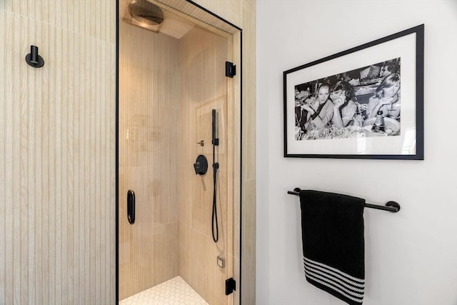 bathroom featuring a shower stall