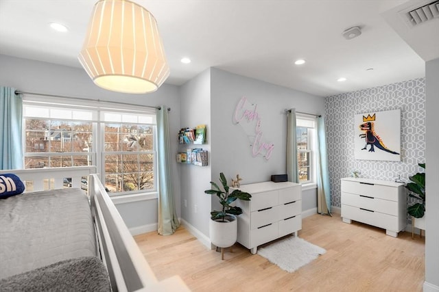 bedroom featuring visible vents, wallpapered walls, baseboards, recessed lighting, and light wood-style flooring