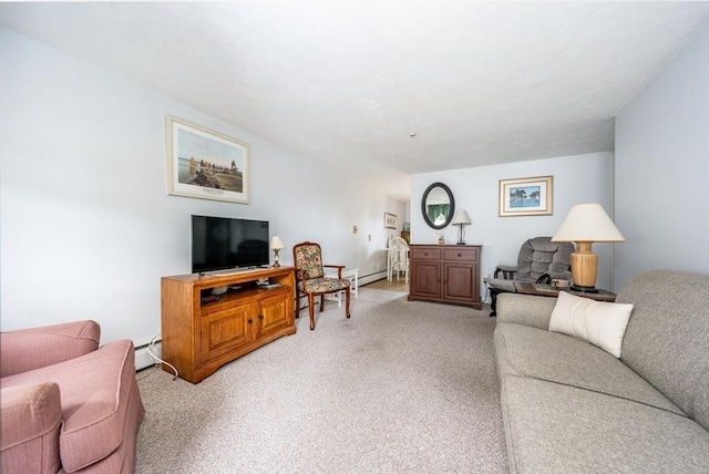 living area with a baseboard heating unit and light colored carpet