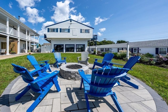 view of patio / terrace with a fire pit