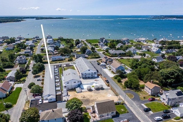 aerial view featuring a water view and a residential view