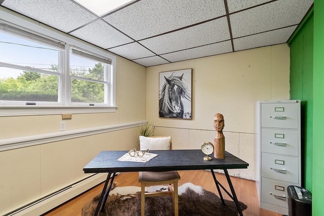 82 Powow St, Amesbury, MA 01913 - office featuring a drop ceiling, a baseboard heating unit, and wood finished floors