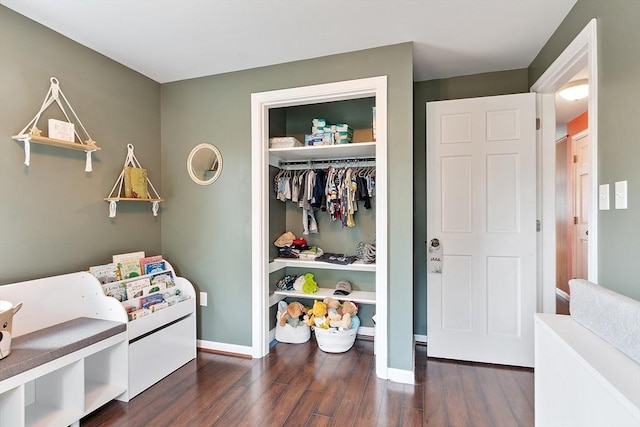 82 Powow St, Amesbury, MA 01913 - bedroom with dark wood finished floors and a closet
