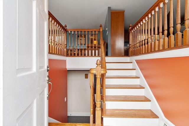 82 Powow St, Amesbury, MA 01913 - staircase with baseboards