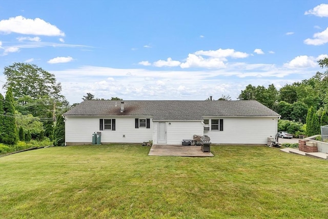 82 Powow St, Amesbury, MA 01913 - rear view of property featuring a deck and a yard