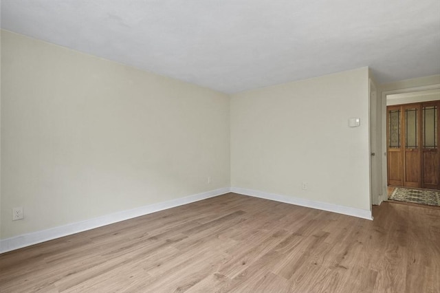 9 Broadway Unit 217, Saugus, MA 01906 - spare room with light wood-style floors and baseboards