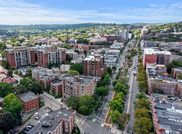 birds eye view of property with a city view