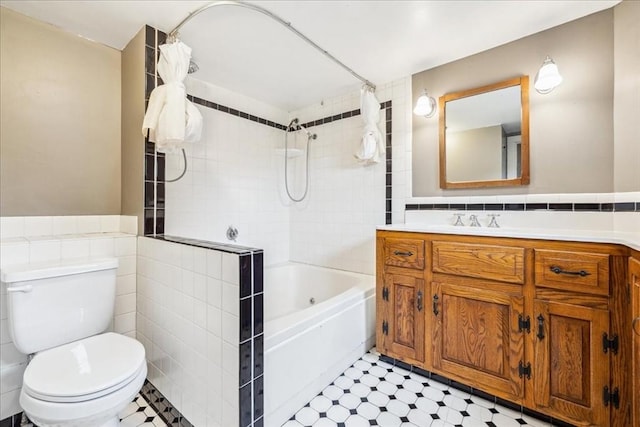 bathroom featuring shower / tub combo with curtain, tile patterned floors, toilet, and tile walls