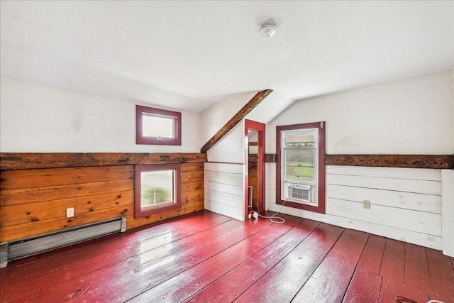 bonus room with vaulted ceiling, baseboard heating, and hardwood / wood-style floors