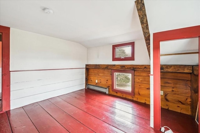 bonus room featuring hardwood / wood-style flooring, baseboard heating, and lofted ceiling