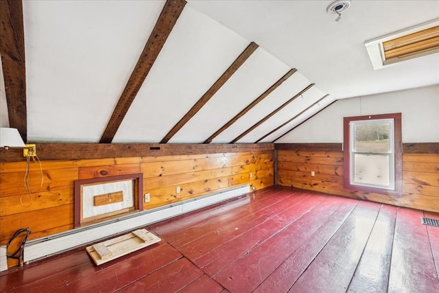 bonus room with wood walls, a baseboard radiator, lofted ceiling with beams, and wood-type flooring