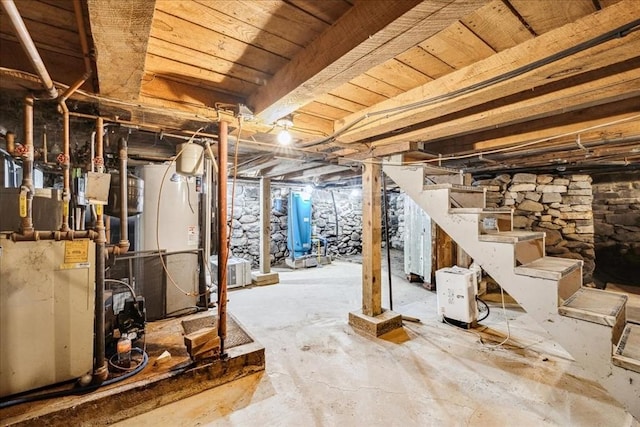 unfinished below grade area featuring stairway