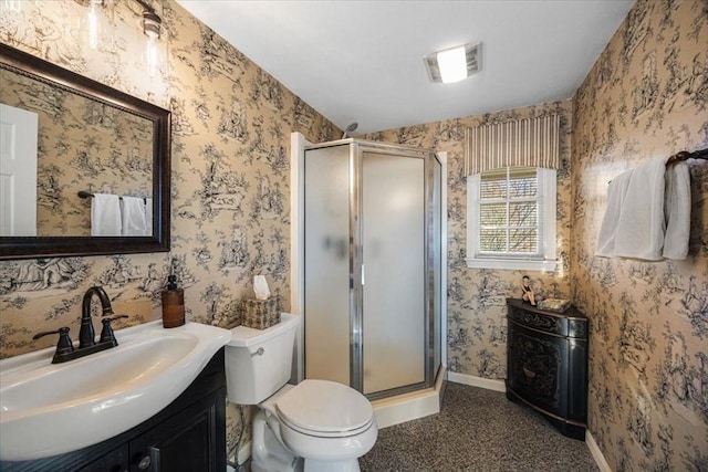 full bathroom with visible vents, vanity, a shower stall, and wallpapered walls