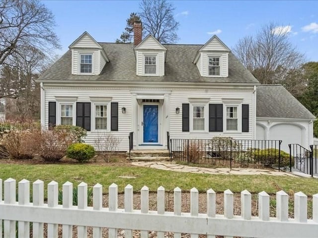 cape cod-style house featuring a fenced front yard, a chimney, a front lawn, a shingled roof, and a garage