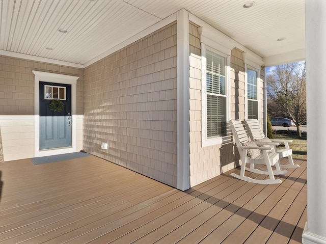 deck featuring covered porch