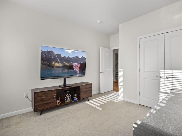 carpeted bedroom featuring a closet